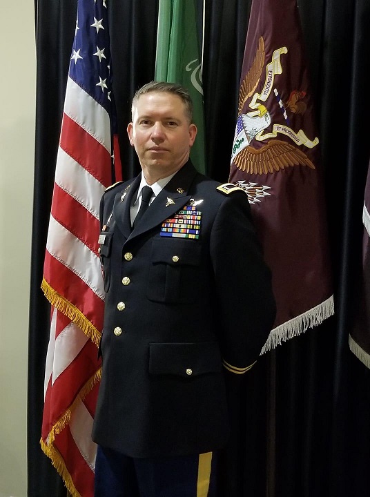 Kevin in military uniform with medals